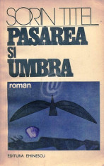 Pasarea si umbra foto