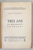 TREI ANI CU REFUGIATII ARDELENI de IUSTIN HANDREA , SERIA &#039; CARTEA REFUGIATULUI ARDELEAN &#039; NR. 12 , ANII &#039;40 , COPERTE REFACUTE , DEDICATIE *