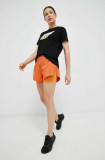 Cumpara ieftin Reebok pantaloni scurți de alergare culoarea portocaliu, neted, medium waist