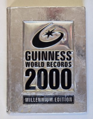 GUINNESS WORLD RECORDS 2000 * DEFECTE COPERTA foto