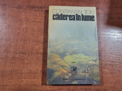Caderea in lume de Constantin Toiu foto