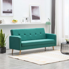 Canapea din material textil verde foto