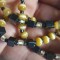 Lantisor handmade cu bilute galbene de sticla si patratele negre inox