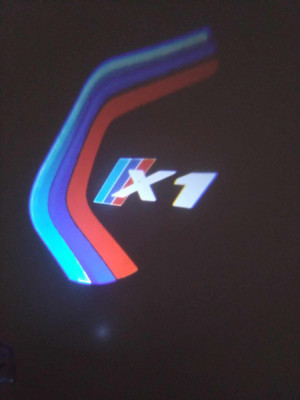 Set 2 Holograme LED cu LOGO BMW X1 pentru Portiere foto