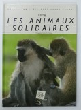 LES ANIMAUX SOLIDAIRES par Dr. JIM FLEGG , photographies DAVID et ERIC HOSKING , 1990