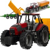 Tractor de ferma cu remorca basculabila, roti mari si piese mobile