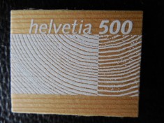 Elvetia-Timbru pe lemn-nestampilat foto