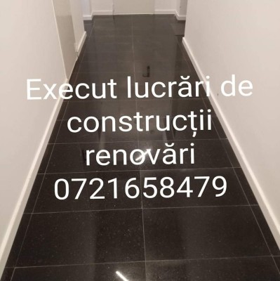 Vind execut lucrări de construcții foto