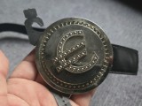 Curea neagra piele ecologica, ca noua, cu semnul Euro la catarama. Lungime curea 1 metru, latime 3.5 cm.