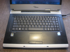 laptop fujitsu v3515 , dualcore ,2 gb ram , fara hdd/alimentator ,functional foto