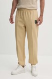 Lacoste pantaloni de trening culoarea bej, neted