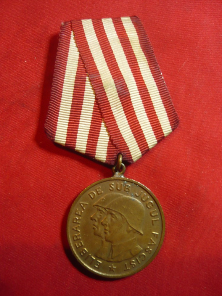 Medalie Eliberarea de sub Jugul fascist / In slujba poporului muncitor RPR  | arhiva Okazii.ro