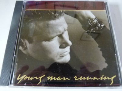 Young man running - Corey Hart, cd foto
