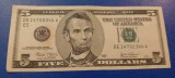 Bancnota 5 Dollars SUA Serie 2003 DE14702344A LINCOLN