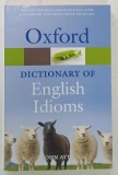 OXFORD DICTIONARY OF ENGLISH IDIOMS by JOHN AYTO , 2010 * TEXT IN LIMBA ENGLEZA