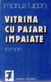 Vitrina cu pasari impaiate