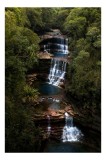 Tablou Canvas, "Cascada misterioasă din inima pădurii", Cascade, Vegetație, Apă, St&acirc;nci, Natură, Scurgere, Pădure, Peisaj, Lumină, Răcoritor, 26 x 39
