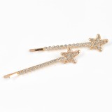 Set 2 agrafe de par aurii cu stele si pietre acrilice