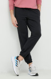 Adidas pantaloni de trening bărbați, culoarea negru, uni IC9770