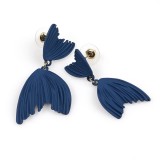 Cercei albastri cu design abstract si textura in relief