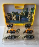 Cumpara ieftin Set vintage 6 Masinute Utilaje pt Constructii, motoare frictiune, tractiune 4 x 4; &icirc;n servietă / caseta, editie Colectie, sc 1:72, New Ray, anii '90