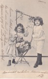 Fetita in rochie plisata si baiat in costum de marinar (circulata 1906)