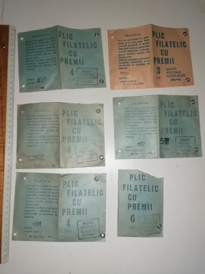 LOT 6 PLICURI FILATELICE CU PREMII , ANII 80 - FIECARE ARE CATEVA TIMBRE foto