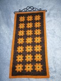 Decor vechi brodat cusut tapiserie veche de perete broderie manuala maro flori portocalii Suedia pe suport metalic