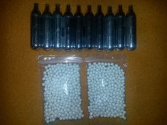 airsoft 20 capsule butelii swiss arms + 2500 bile teflon 6 mm ( 0.25 ) foto