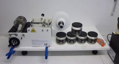 Sistem de etichetare/ etichetare recipiente cilindrice