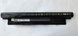 Baterie Laptop DELL XCMRD LA 14,8 V - 2360 mAh . PROVINE DIN DEZMEMBRAREA UNUI LEPTOP DEFECT .NU STIU DACA TINE CURENT .