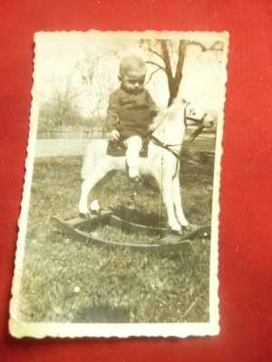 Fotografie veche -Baietel pe calutul din lemn - Romania ,dim.=5,7x8,6cm foto