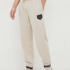 Armani Exchange pantaloni de trening culoarea maro, cu imprimeu