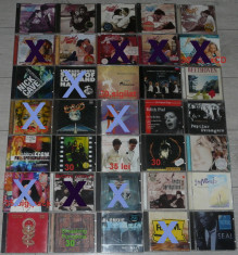CD Rock,hip hop,Michael Jackson,Doors,Europe,DJ Bobo,Madonna,Yes,Enigma foto