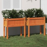 Cumpara ieftin Jardiniere grădină cu picioare, 2 buc., maro ceruit, lemn pin