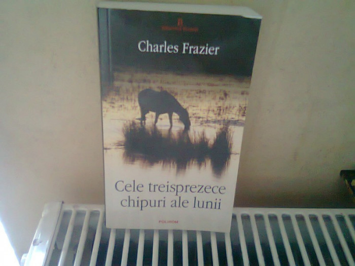 CELE TREISPREZECE CHIPURI ALE LUNII - CHARLES FRAZIER