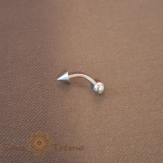 Piercing cu tija curbata, sageata mare si bila mare foto