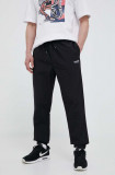 Hummel pantaloni de trening culoarea negru, cu imprimeu