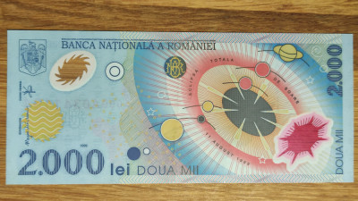 Romania bancnota 2000 lei 1999 eclipsa -mokazie- la cumparaturi de peste 200 lei foto