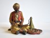 Statuetă din antimoniu pictat la rece - Turc fum&acirc;nd narghilea - cca.1900