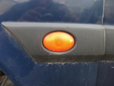 Lampa semnalizare aripa stanga fata Ford Fiesta An 2000 foto