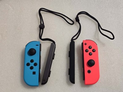 Set 2 x Controller Joy-Con NINTENDO Switch, albastru-rosu + sistem de fixare inchietura foto