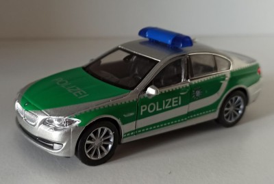 Macheta BMW seria 5 (F10) 2010 535i Politia Germana- Welly 1/36 foto