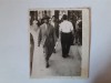 Fotografie cca 3/6 cm cu bărbat pe stradă