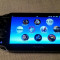 vand consola ps vita cu 20 jocuri ,husa,card, WI FI