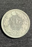 Moneda 1/2 franci 1981 Elvetia