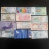 LOT SET de 10 bancnote straine UNC (necirculate) diferite plus două rom&acirc;nești, Asia