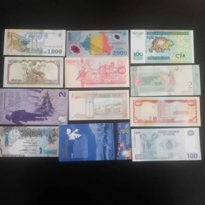 LOT SET de 10 bancnote straine UNC (necirculate) diferite plus două rom&amp;acirc;nești foto