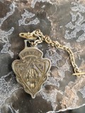 Medalion Gucci