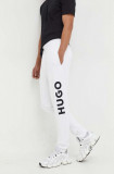 HUGO pantaloni de trening din bumbac culoarea negru, cu imprimeu 50473211